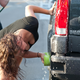 Illustration for article titled Noir Leather Bikini Car Wash Meetup Pictures